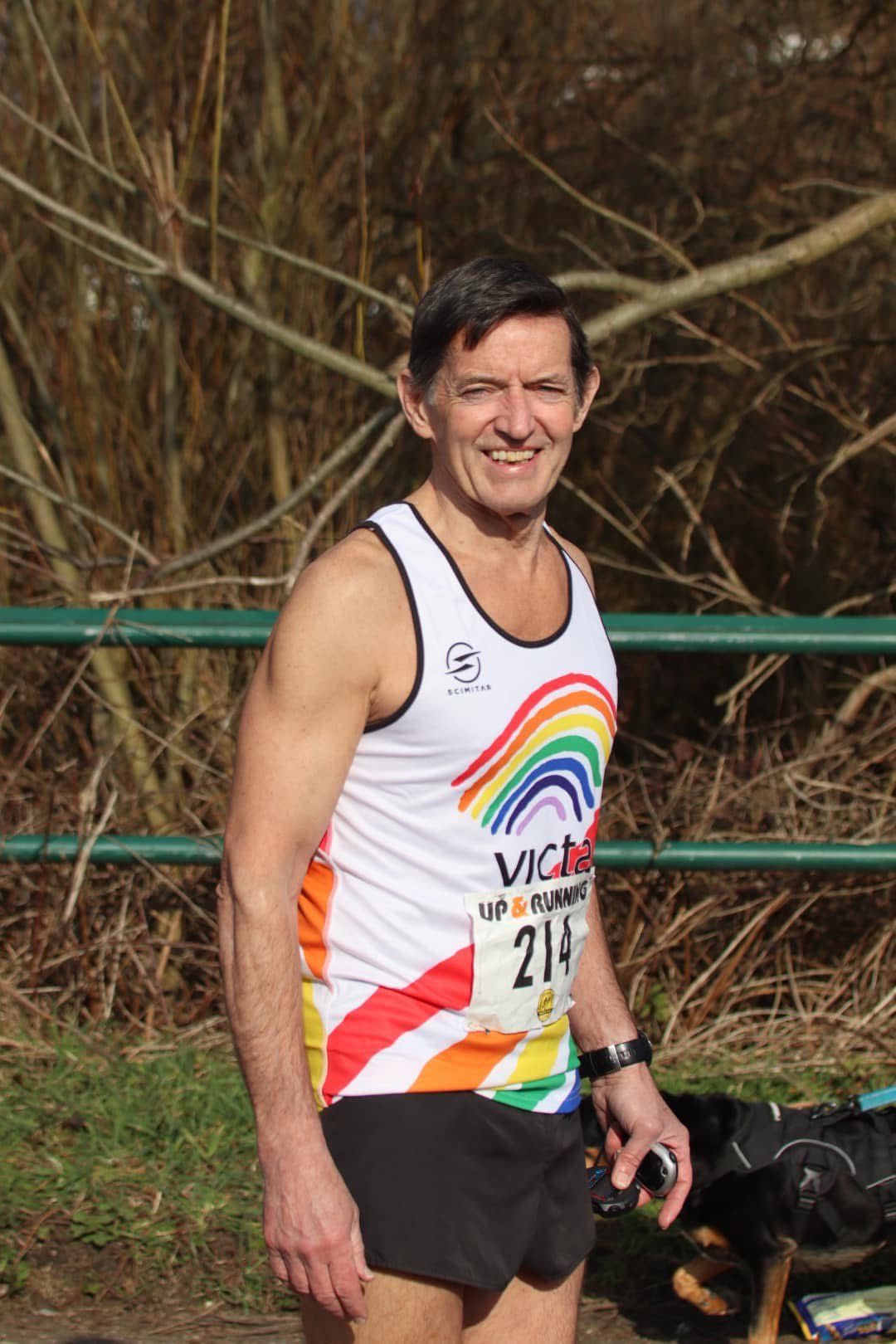 patrick kimmy killer vest pic Patrick smiling in his VICTA rainbow running vest