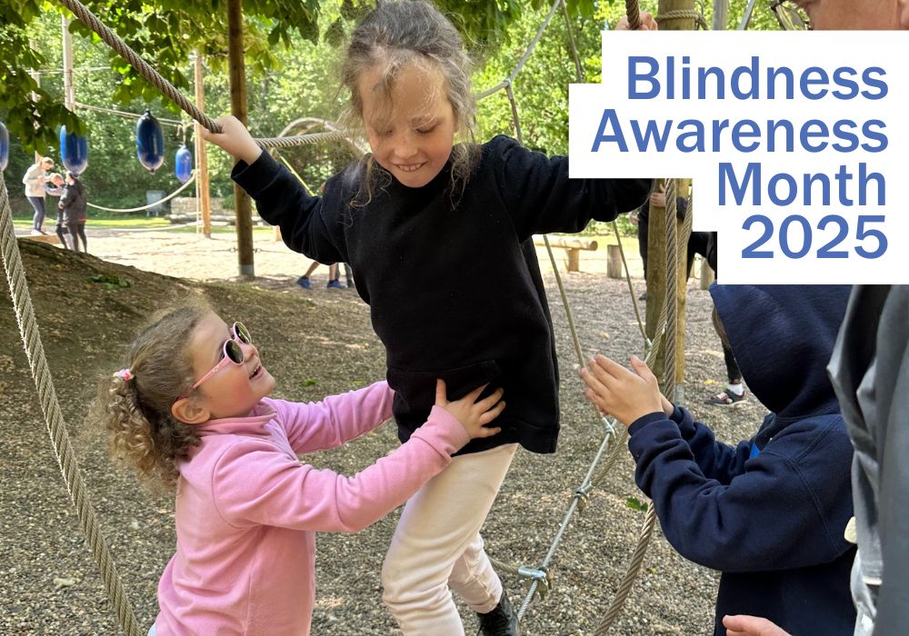 vision impaired children support each other on low ropes - Blindness Awareness Month 2025