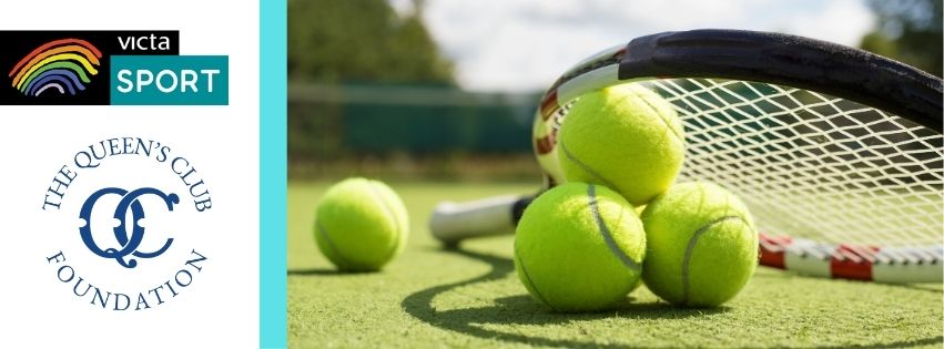 Tennis balls and racket on a court
