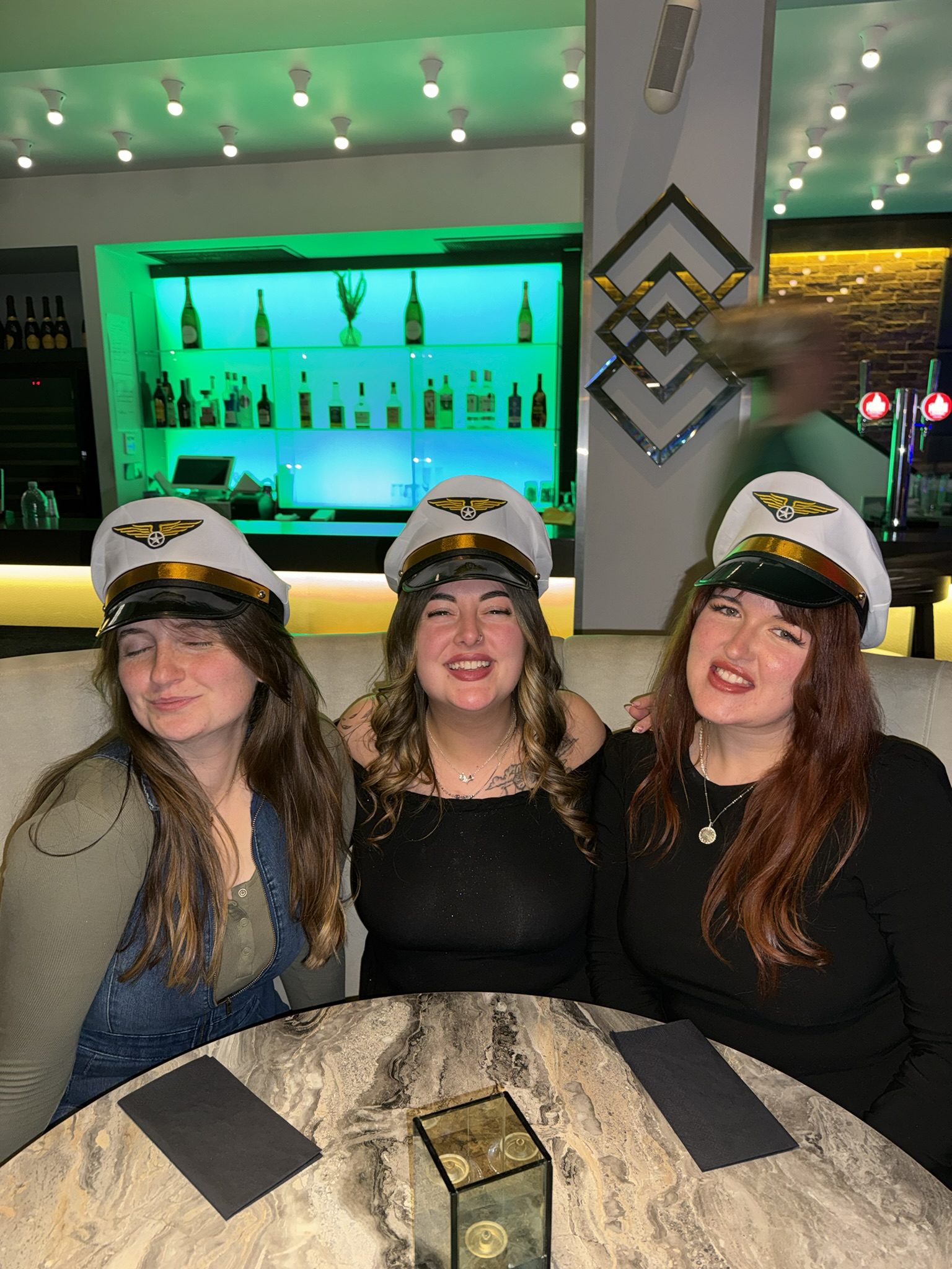 Wearing pilot caps at the brunch