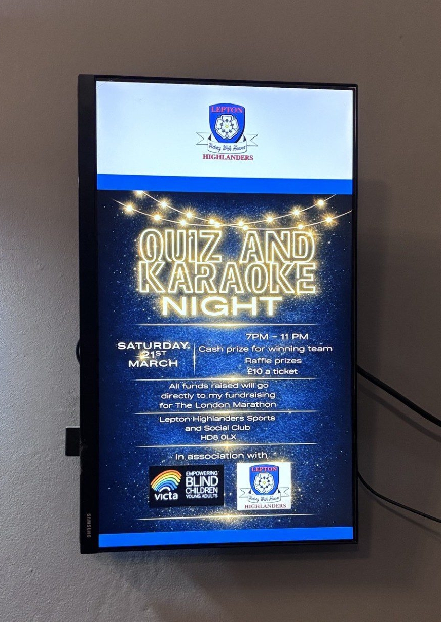 Quiz & Karaoke night poster up on a TV screen