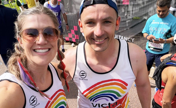 new-runners-feature Two VICTA runners take a selfie with bright rainbow vests on